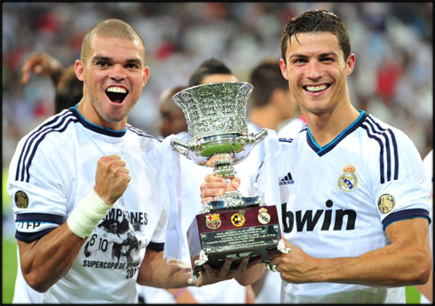 cristiano-ronaldo-548-and-pepe-holding-the-spanish-super-cup-trophy-in-2012