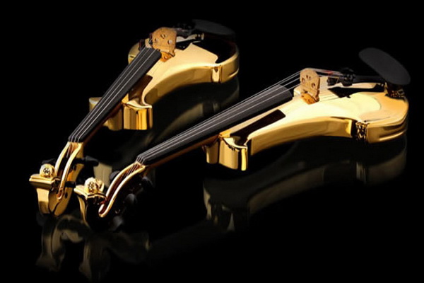The worlds first gold-plated violins are studded with precious stones and cost $2 million
