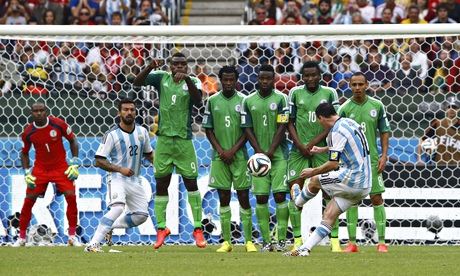 Argentina's Lionel Messi scores his second goal against Nigeria from a free-kick in Group F.