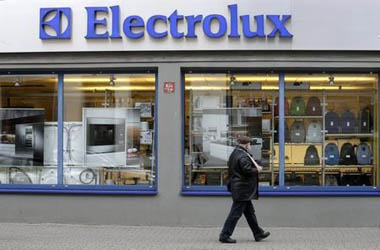 A man walks past an Electrolux shop in Riga