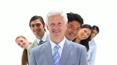 stock-footage-business-team-in-line-behind-their-boss-against-a-white-background