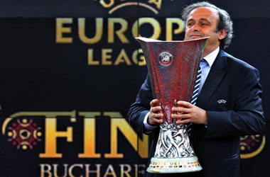 epa03178720 UEFA President Michel Platini holds the UEFA Europa League trophy during a handover ceremony at National Arena stadium in Bucharest, Romania, 11 April 2012. The UEFA Europa League final 2012 will be held at National Arena Stadium in Bucharest on 09 May 2012.  EPA/ROBERT GHEMENT