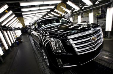 A Cadillac Escalade passes through a final inspection point at the General Motors Assembly Plant in Arlington, Texas June 9, 2015. General Motors Co is raising the stakes on its bet that sales of fuel-thirsty sport utility vehicles will keep driving its global profits as Chinese and other markets sag. GM said on July 14, 2015 that it plans to spend $1.4 billion to modernize the factory in Arlington, Texas, that builds the Cadillac Escalade, Chevrolet Suburban and GMC Yukon sport utility vehicles. It's the largest single investment in a $5.4 billion, three-year plant upgrade program announced earlier this year. Picture taken June 9, 2015. To match Insight GM-SUVS/ REUTERS/Mike Stone - RTX1L98U