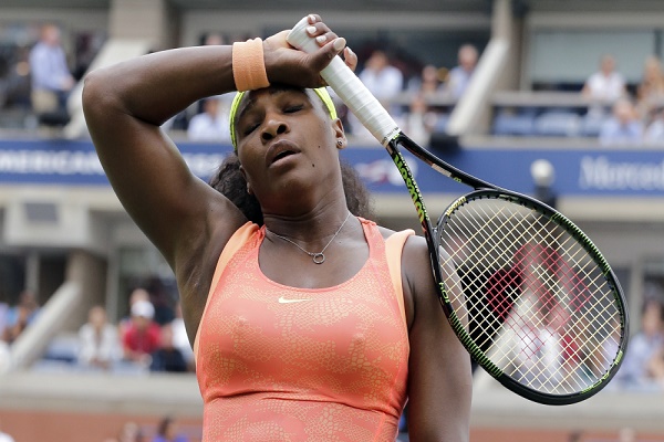 Serena Williams reacts after losing a point to Roberta Vinci, of Italy, during a semifinal match at the U.S. Open tennis tournament, Friday, Sept. 11, 2015, in New York. (AP Photo/Bill Kostroun) ORG XMIT: USO256