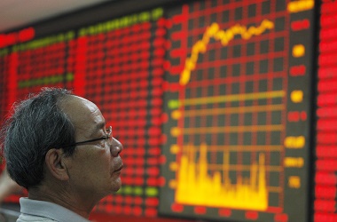 HUAIBEI, CHINA - JUNE 14:  (CHINA OUT) An investor watches the electronic board at a stock exchange hall on June 14, 2011 in Huaibei, Anhui Province of China. International markets have been buoyed by the release of economic data from China allaying fears of a severe slowdown in the country's economy.  (Photo by ChinaFotoPress/Getty Images)