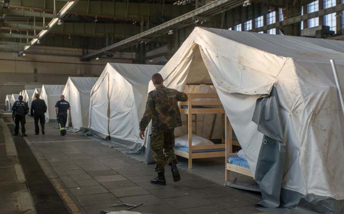 Army convert the former Berlin Tempelhof Airport in refugee shelter