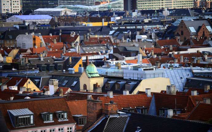 12 Aug 2014, Copenhagen, Zealand, Denmark --- View of city roofs from Rundetaarn, or the round tower, 17th century tower and observatory, the oldest functioning observatory in Europe, Copenhagen, Denmark. --- Image by © Nano Calvo/Corbis