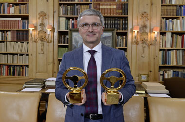 Rupert Stadler, Chairman of the Board of Management of AUDI AG, with the Golden Steering Wheels 2015 for the Audi A4 Sedan and the Audi R8.