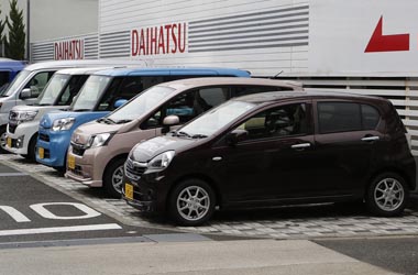 Daihatsu Motor Co.'s Mira e:S and other Daihatsu cars are displayed at the company's dealership in Tokyo