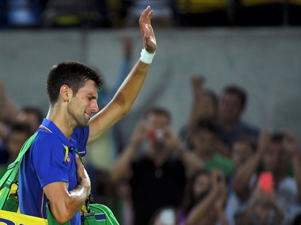 2016 Rio Olympics - Tennis - Preliminary - Men's Singles First Round - Olympic Tennis Centre - Rio de Janeiro, Brazil - 07/08/2016. Novak Djokovic (SRB) of Serbia reacts after losing his match against Juan Martin Del Potro (ARG) of Argentina. REUTERS/Toby Melville  FOR EDITORIAL USE ONLY. NOT FOR SALE FOR MARKETING OR ADVERTISING CAMPAIGNS.    Picture Supplied by Action Images