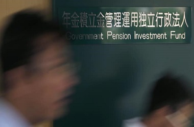 People walk past a signboard of Government Pension Investment Fund outside the entrance of GPIF in Tokyo...People walk past a signboard of Government Pension Investment Fund (GPIF) outside the entrance of GPIF in Tokyo September 29, 2014. Japan's $1.2 trillion public pension fund, the world's largest, will delay a highly anticipated decision on shifting its portfolio allocations to November or later, people familiar with the process said on October 7, 2014. Picture taken September 29, 2014. REUTERS/Yuya Shino (JAPAN - Tags: BUSINESS) - RTR496GK