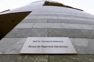 A sign is seen beside the entrance of the Bank for International Settlements in Basel