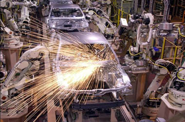 Assemblyline robots weld the new 2005 Ford Mustang at the AutoAlliance International plant in Flat Rock, Mich., Monday, Sept. 27, 2004. The new car, built at the auto plant that Ford co-owns with Mazda Motor Corp., is scheduled to reach showrooms next month. (AP Photo/Carlos Osorio)